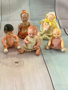 small figurines of children sitting on the floor