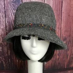 Cloche Hat- Grey Tweed Wool With Grey Band All Grey Different From The Photo ,Asymmetrical Brim, Lined In Rayon Print, The Hat Has A 3 Section Fitted Top And A One Piece Asymmetrical Brim. And Has A Cotton Band Inside. This Hat Is One Size Fits All And Will Fit 21" - 23" Head Size. All Of Bella Starr Hats Are Made And Designed From My Drafted Original Patterns. Bella Starr Hats Are Made With Vintage Wools, Buttons And Come In Limited Quantities. Caring For Your Hat: Dry Clean Only Casual Fitted Cloche Hat For Fall, Adjustable Tweed Hat For Winter, One Size Wide Brim Cloche Hat For Fall, One Size Fall Wide Brim Cloche Hat, Fall Wide Brim Cloche Hat, Fall Tweed Hat With Short Brim, Casual Tweed Hat With Curved Brim, Fitted Tweed Hat For Fall, Fitted Tweed Fall Hat