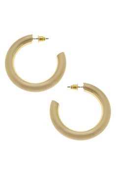 Satin-finished gold plating gives this classic hoop earring a luxurious look & feel! Our Arabella Hoop Earrings in Gold Satin will easily become your new favorite go-to hoop. Also available in Satin Silver! DETAILS: Base Metal with Satin-Finished Plating 1.6"L x 1.6"W Matte Gold Hoop Earrings, Stacked Bangles, Gold Satin, Earrings In Gold, Bangle Set, Gold Hoop, Gold Hoop Earrings, Initial Necklace, Base Metal