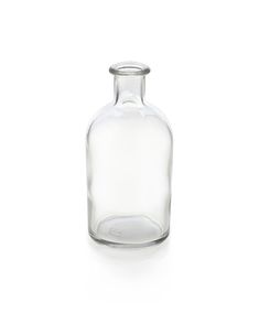 an empty glass bottle on a white background