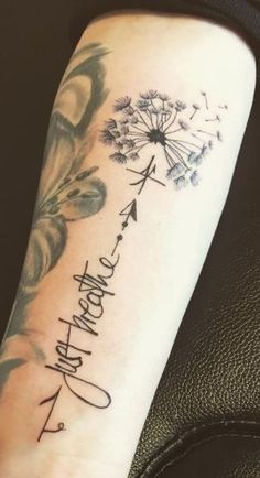 a woman's arm with a dandelion tattoo that reads, happy birthday