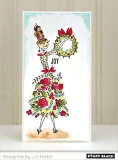 a christmas card with a woman holding a wreath and the words joy written on it