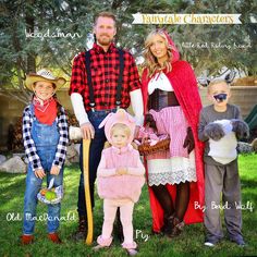 a family dressed up in costumes for halloween