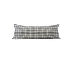 a black and white checkered pillow on a white background