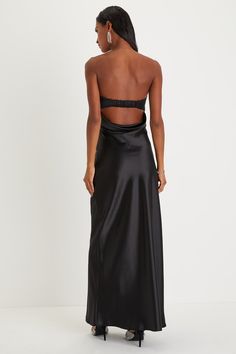 You'll be the classiest invite of the night in the Lulus Exquisite Shine Black Satin Rhinestone Strapless Maxi Dress! Sleek woven satin shapes this luxurious dress that features a strapless bodice with a rhinestone-trimmed sweetheart neckline (with hidden no-slip strips) that peaks out from a cute foldover detail. The figure-flattering slip silhouette falls to an elegant maxi hem. Hidden side zipper/clasp. Fit: This garment fits true to size. Length: Floor length. Size medium measures 52.25" from top to bottom. Bust: Great for any cup size. Waist: Fitted - very fitted at natural waist. Hip: Loosely Fitted. Undergarments: May be worn with an adhesive bra, petals, or no bra. Fabric: Fabric has no stretch. Lined. Shell: 97% Polyester, 3% Spandex. Lining: 95% Polyester, 5% Spandex. Exclusive O Sparkly Black Long Dress, Black Corset Long Dress, Black Long Silk Dress, Black Satin Bridesmaid Dresses, Black Long Dress Elegant, Black Satin Bridesmaid Dress, Black Long Dresses, Classy Long Dress, Satin Black Dress