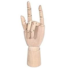 a wooden hand that is holding two fingers