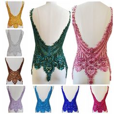 six different types of bras on mannequins, each with beading