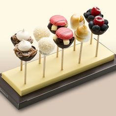 there are many different desserts on the stick