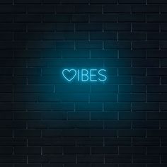 a neon sign that says, bes on a brick wall in the shape of a heart