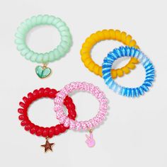 Accessorize your little one's look with the cute Girls' 5pk Phone Cord Bracelet Set from Cat & Jack™. Each bracelet features a unique and adorable phone cord design made of acrylic and zinc alloy. Ideal for easy mixing and matching, these assorted bracelets come with added charms that make for a fun addition to your little one's collection. Cat & Jack™: Designed for all children so you can trust it's made for yours. Cheap Pink Wristband With Colorful Beads, Cheap Pink Bracelet With Adjustable Cord, Playful Pink Adjustable Bracelets, Playful Adjustable Pink Stretch Bracelet, Adjustable Pink Stretch Bracelet - Fun Style, Sparkle Leggings, Phone Cords, Stretch Bands, Rainbow Bracelet