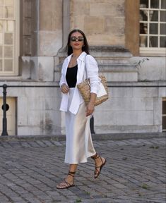 Slip Skirt Party, Silk And Knit Outfits, Column Skirt Street Style, Chic Elevated Outfits, Parisian Work Style Summer, Sophisticated European Style, Spain Work Outfits, Cream Slip Skirt Outfit Summer, White Slip Skirt Outfit Summer