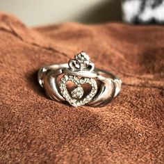 Antique Genuine Irish Claddagh Ring, Sterling Silver 1/4 Carat Diamonds. Perfect For Engagement Or Promise Rings, For Friendship, Or Even A Gift For Yourself. Approximately Size 7. Very Cute, Has Been Professionally Cleaned Recently. Open To Offers. Irish Engagement Rings, Claddagh Engagement Ring, Diamond Claddagh Ring, Silver Claddagh Ring, Irish Ring Claddagh, Irish Rings, Irish Claddagh, Claddagh Ring, Claddagh Rings