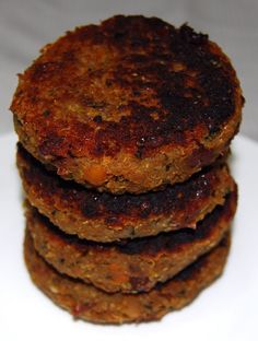 three patties are stacked on top of each other