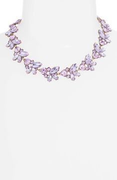 Clusters of sparkling crystals dazzle a statement-making necklace that sits elegantly above your collarbone. 17" length; 3" extender Lobster clasp closure Goldtone plated/glass Imported Lavender Crystal Jewelry For Party, Statement Collar, Statement Collar Necklace, Collar Bone, Statement Choker, Topaz Color, Brass Glass, How To Make Necklaces, Lavender Color