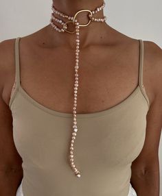 ** Pearl Necklace loops through Ring and can be wrapped once or multiple times. PEARLS are symbolic of wisdom gained through experience. The gems are believed to offer protection, as well as attract good luck and wealth. They are well-known for their calming effects. Pearls have a way of bringing balance to your karma, bring illumination, enlightenment, and insights on a mental level. Pearls symbolize purity and is known as a “stone of sincerity”. It brings truth to situations and loyalty to a “ Adjustable Gemstone Amulet Jewelry, Elegant Wire Wrapped Lariat Jewelry, Artisan Wire Wrapped Jewelry For Wedding, Artisan Wire Wrapped Wedding Jewelry, Elegant Infinity Gemstone Jewelry, Bohemian Pearl Chain For Jewelry Making, Adjustable Lariat Fine Jewelry, Elegant Wire Wrapped Necklaces, Unique Pearl Chain Jewelry As Gift