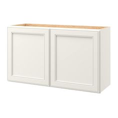 a white cabinet with two doors on the side and one door open to reveal an unfinished drawer