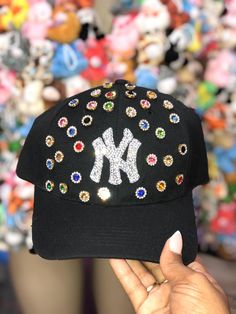 Viral Trend Bling NY, Atl, or LA hat.  Adjustable Velcro fit.  Bling Logo makes this hat stand out above the rest! Fall is here and this hat is going to accent whatever outfit you decide to wear! Very Blingy, Very Cutesy, Very Fashionable it's giving OH THIS GIRL GOT STYLE STYLE If you want to request another color hat or even a different custom design please feel free to message me and I got you covered!  Make sure to follow my Instagram and tag me when you post this piece  @ Riris.Party Bedazzled Hats Baseball Caps, Bedazzled Hat, Bedazzling Ideas, Girl Updo, Diy Hats, Rhinestone Hat, Custom Fitted Hats, Swag Hats, Ny Hat