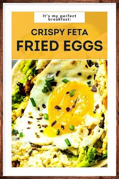 crispy feta fried eggs on top of broccoli in a wooden frame