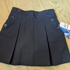 New With Tags Color: Navy Size: Girls' 6x School Uniform Poplin Scooter With Button Pockets Stretch Fabric Pleated Shell With Shorts Underneath Elastic Waistband Girls School Uniform, Navy Uniforms, Pink Polka Dot Dress, Grey Trench Coat, Compression Pants, Skorts, Polka Dot Dress, Denim Top, Blue Shorts