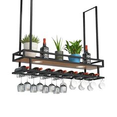 a shelf with pots and glasses hanging from it