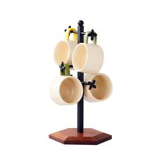 a wooden stand with cups and mugs hanging from it's sides on top of each other