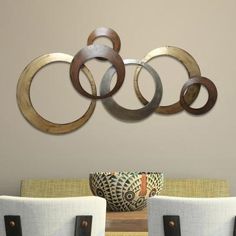 the olympic rings are hanging on the wall