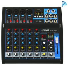 an audio mixing console with many knobs and controls on it's side,