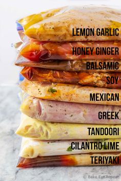 a stack of different types of food wrapped in plastic