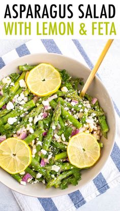 asparagus salad with lemon and feta in a white bowl on a blue striped tablecloth