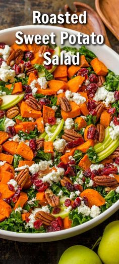 roasted sweet potato salad with cranberries and pecans in a white serving dish