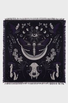 a black and white tapestry with an image of a cat sitting on top of the moon