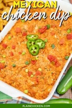 mexican chicken dip in a casserole dish with jalapenos