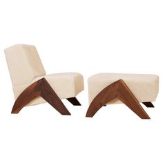 pair of mid century modern lounge chairs and ottomans in walnut and cream fabric for sale