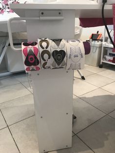 a sewing machine sitting on top of a tiled floor