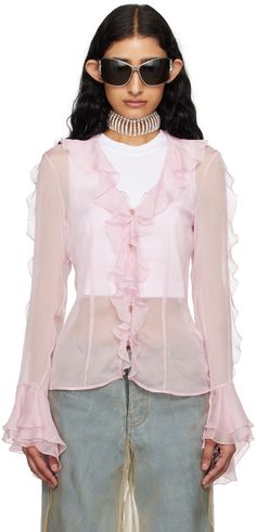 Semi-sheer silk chiffon blouse. Ruffles throughout. · V-neck · Button closure · Darts at front and back · Layered trim at flared cuffs Supplier color: Pink Classy Whimsical Fashion, Flower Ruffle Top, Sheer Button Up Blouse Outfit, Flowy Blouse Outfit, Ruffle Blouse Outfit, Tank Top Over Shirt, Pink Flowy Top, Baby Pink Blouse, Chiffon Outfit