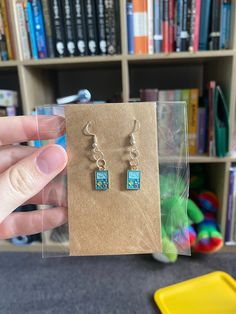 hi! these are my bmo earrings handmade by me! see my other adventure time stuff on my page :) Adventure Time Stuff, Adventure Time Bmo, Adventure Time, Earrings Handmade, Advent, Jewelry Earrings Dangle, Etsy Earrings, Dangle Drop Earrings, Handmade Items