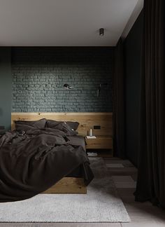 a bedroom with brick wall and wooden bed frame in the center, along with two nightstands on either side of the bed