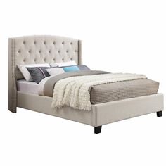 an upholstered bed frame with buttons and tufted headboard, made in beige linen