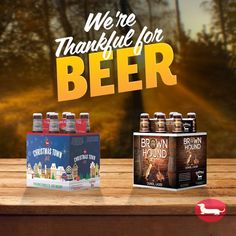 an advertisement for brown hound beer on a wooden table with trees in the background and text that reads, we're thanksgiving for beer