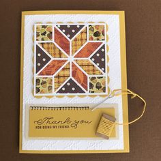 a thank you card with a rubber stamp and some type of crafting material on it