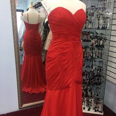 Red Dress Fit And Flair Elegant Red Ruched Gown, Red Fitted Bodice Dress For Prom Season, Red Party Dress With Fitted Bodice, Red Evening Dress With Sweetheart Neckline, Red Dresses With Fitted Bodice For Prom, Red Prom Dress With Fitted Bodice, Red Sweetheart Neckline Evening Dress, Red Ruched Maxi Dress For Formal Occasions, Red Fitted Bodice Evening Dress For Cocktail