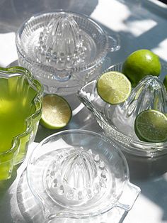 limes and glass dishes on a table