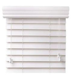 a white window blind with the blinds closed