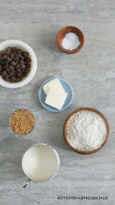 ingredients to make chocolate chip cookies laid out on a table