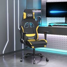 a chair that is sitting in front of a computer