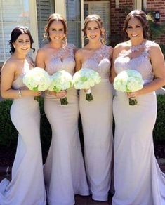 the bridesmaids are all wearing different styles of dresses