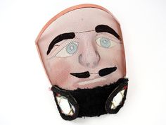 "ArtDecoGalaxy presents: an Antique Wire Mesh Mask used by the Odd Fellows Lodge for Rituals or for Mardi Gras Skits, circa 1900-1920, with hand painted features, attached felt eyebrows and mustache, a plush beard and mirror applications. Probably manufactured by DeMoulin and advertised in their catalog as very desirable for the hot weather, also the masks with attached hair and ornaments were advertised as more luxurious and were more expensive than the plain painted mesh ones. Measures 20 cm ( Luxury Masks And Prosthetics For Mardi Gras, Mesh Mask, Odd Fellows, Wire Mesh, Hot Weather, Mardi Gras, Costume Accessories, North America, 20 Cm