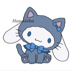 a blue and white cat with a bow on it's head, sitting down