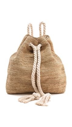 a roped bag is shown on a white background