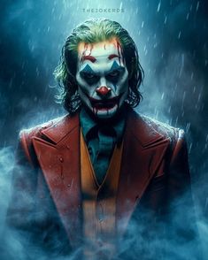 the joker movie poster with it's clown face and red suit in the rain